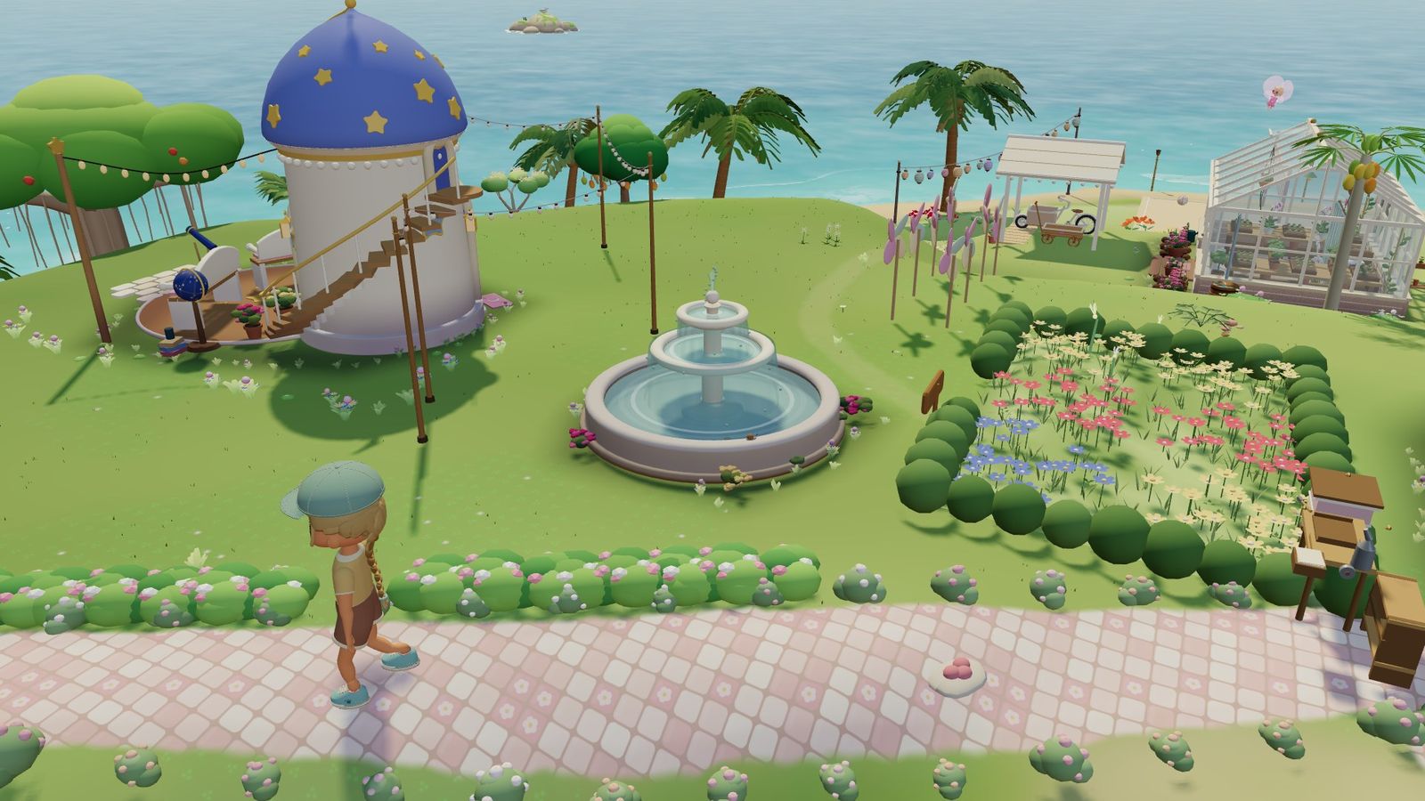 Ein ruhiger Platz mit Brunnen, Blumenbeeten und einem kleinen Sternenturm am Meer